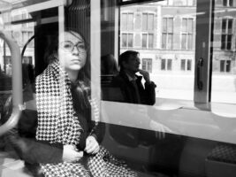 Woman behind a Tram Window