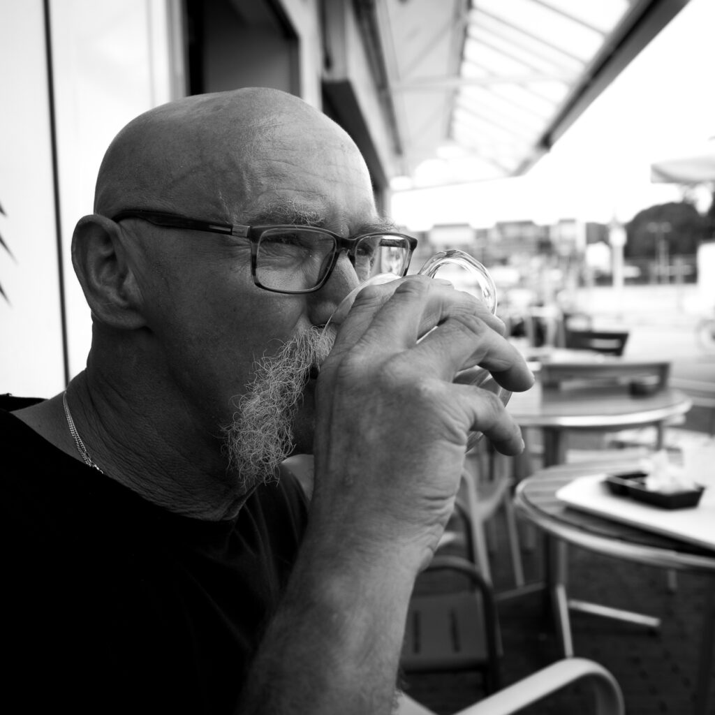Man with an impressive mustache drinking coffee at a cafetaria. Picture taken July 4, 2017 | Aarhof, Alphen aan den Rijn