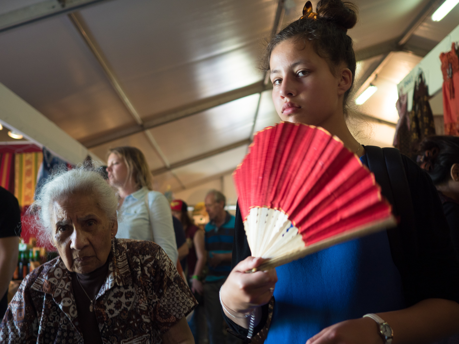 Girl Waving a Hand Fan